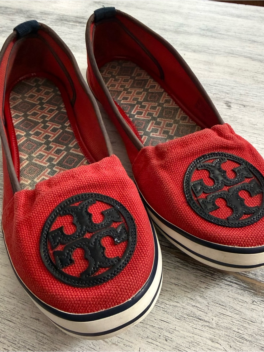 Tory Burch Red Canvas Logo Slip-On Flats with Black Emblem